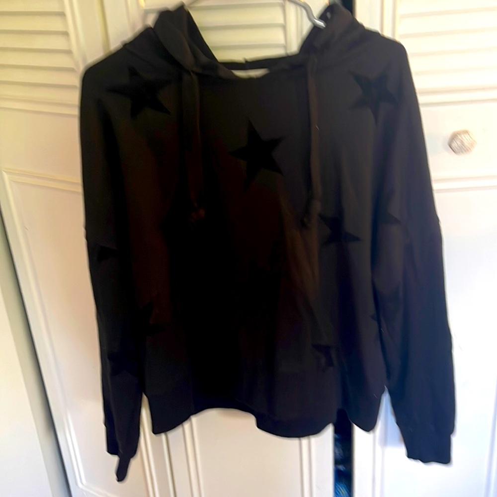 This is a black star sweatshirt